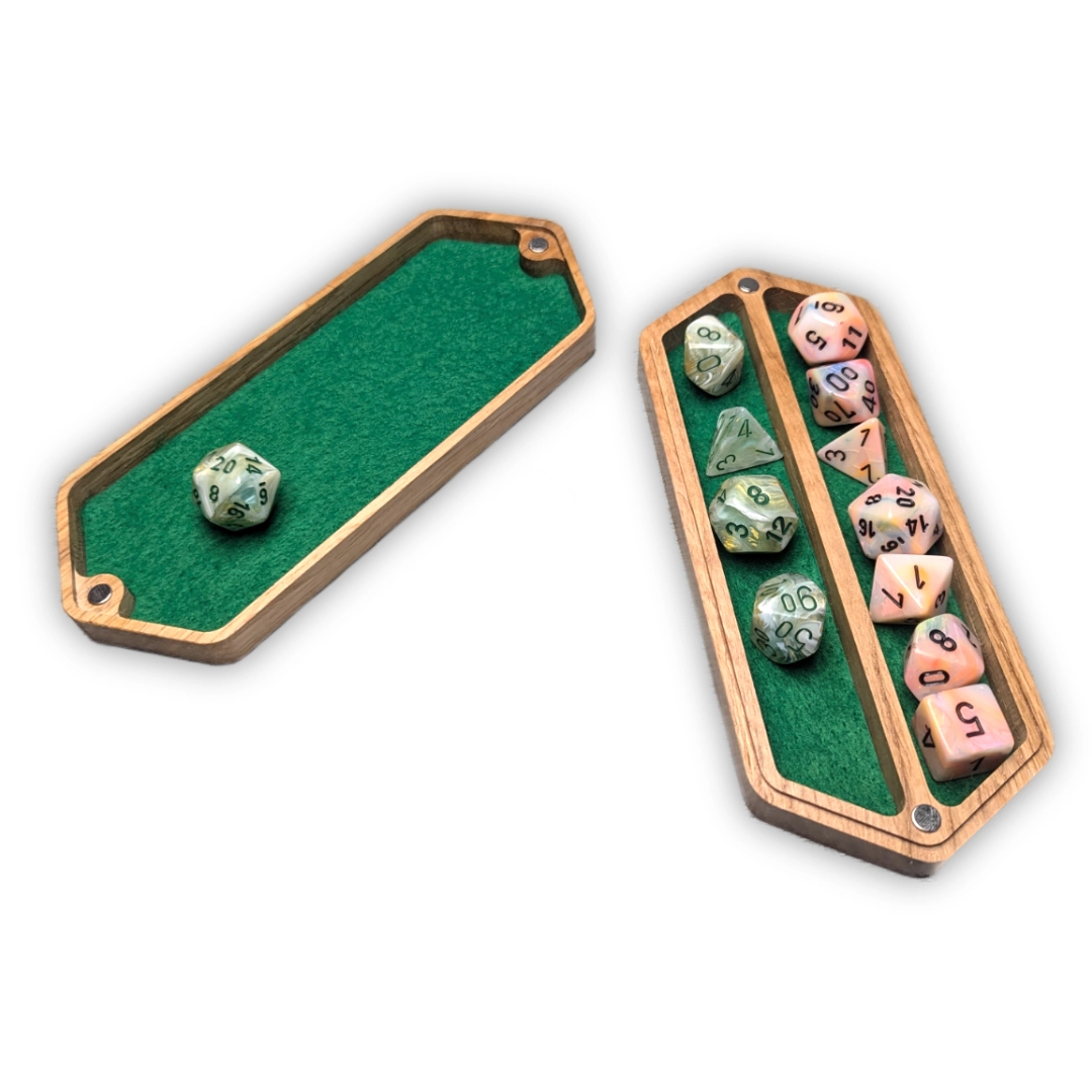 A long dice box, open to show two sets of polyhedral dice and a rolling tray in the underside of the lid.