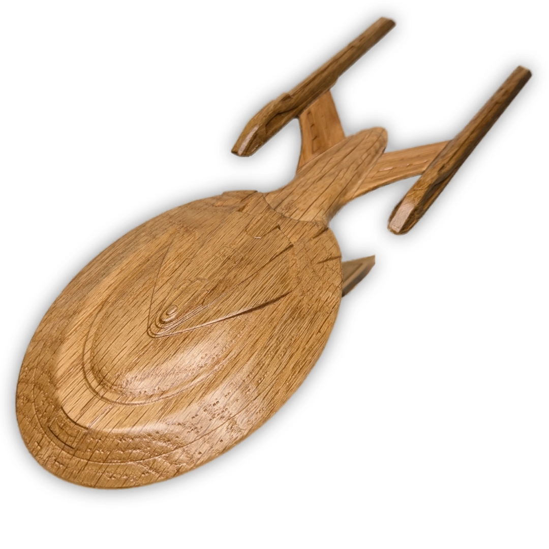 A Star Trek spaceship with an oval saucer section and slim, pointed nacelles.