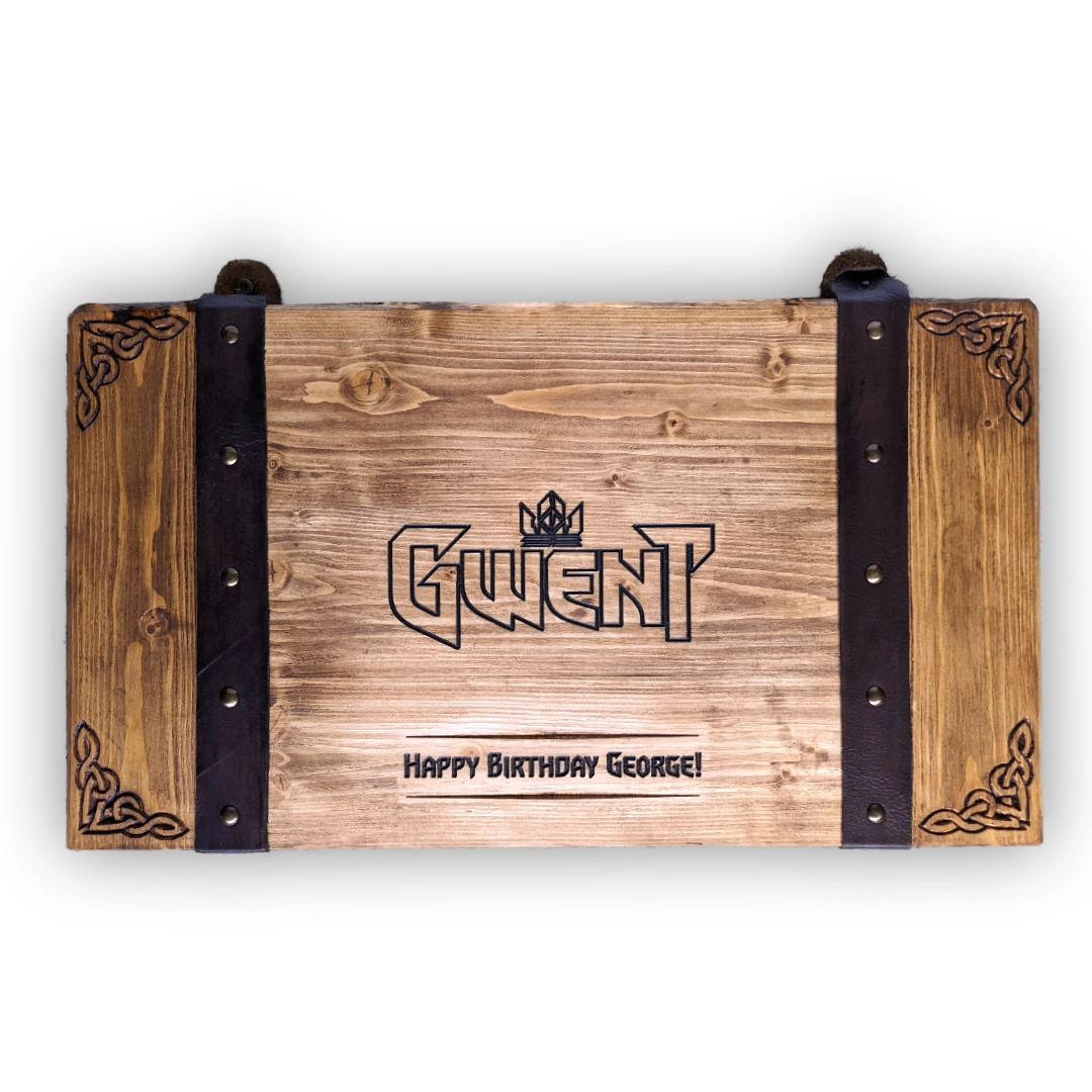 A folded Gwent board, secured with studded leather straps. The engraving reads: 'Happy Birthday George!'